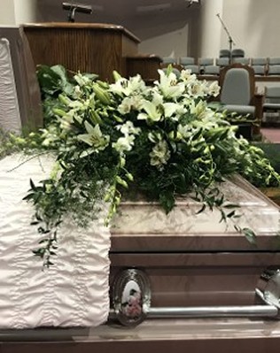 casket flowers in all white for funeral