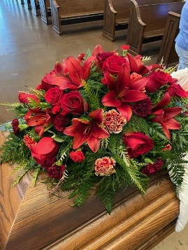 funeral casket spray all red flowers 